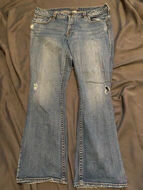 Silver Jeans Light Blue Distressed Flare Jeans